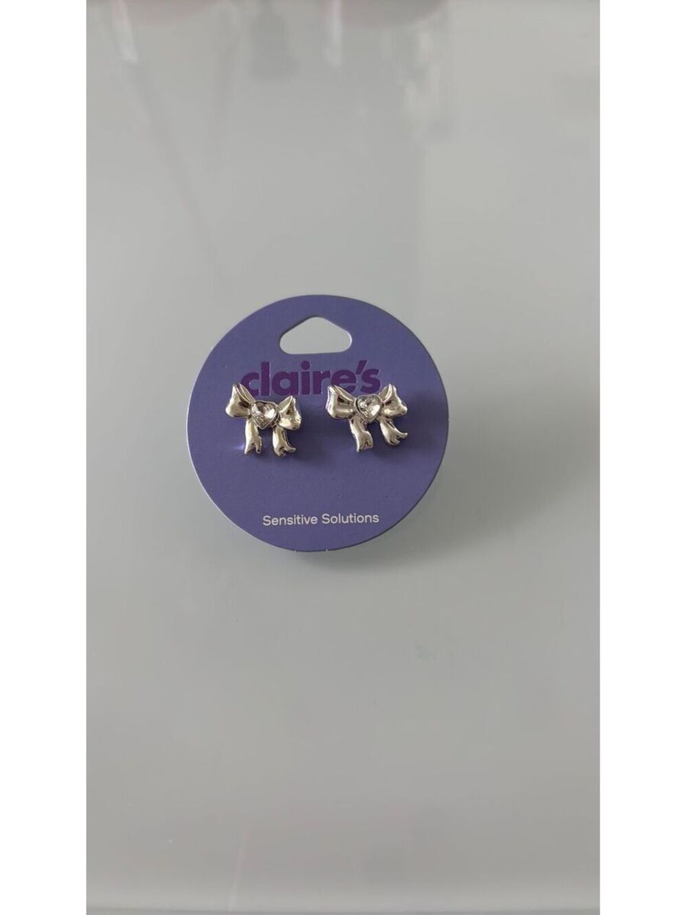 Silver bow earrings